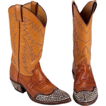Redford's outfit included these rhinestone-studded boots. 
