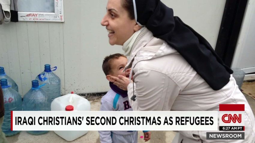 Iraqi Christians celebrate Christmas after fleeing ISIS_00003013.jpg
