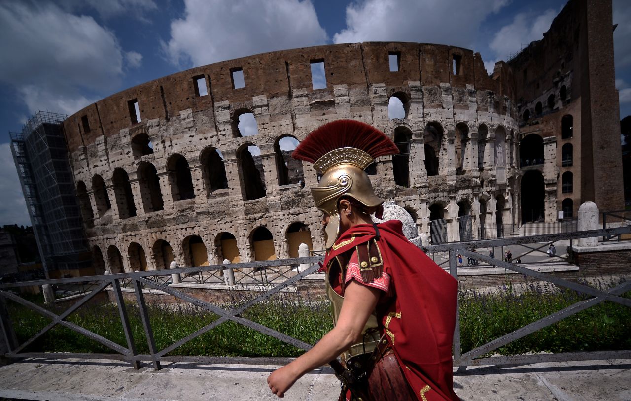 <strong>Rome, Italy: </strong>The Colosseum -- a nearly 2,000-year-old stadium in the middle of a modern city -- is one of the sites that reminds visitors of Rome's glorious (and gruesome) old era.