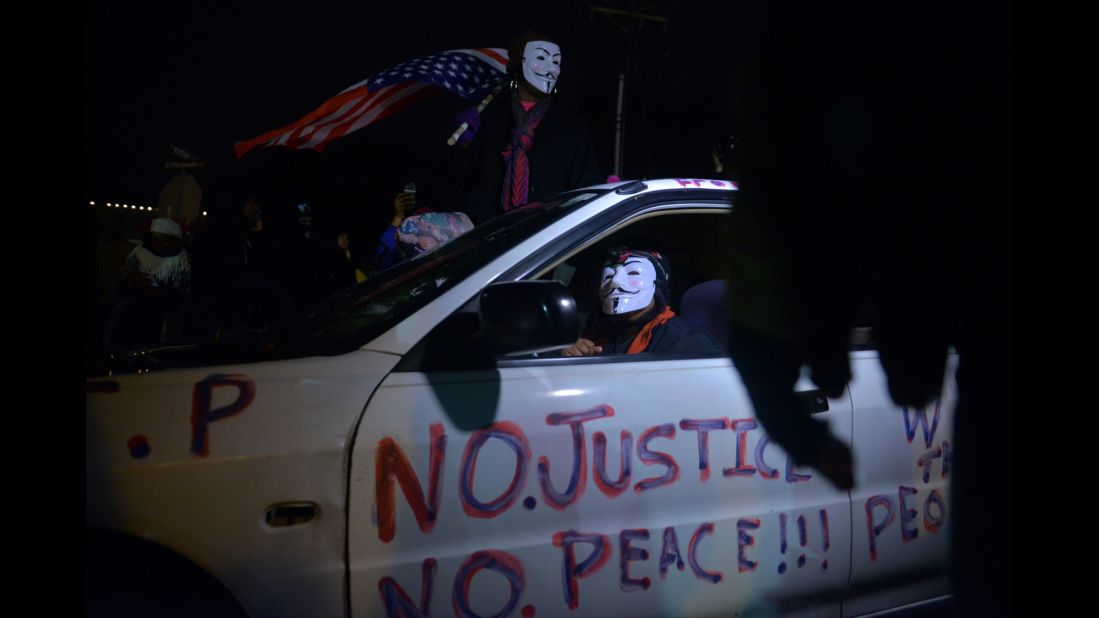 Protests and clashes with police after the officer wasn't indicted in the death of Michael Brown in Ferguson led to another round of protests, with the rallying cry "No justice, no peace."