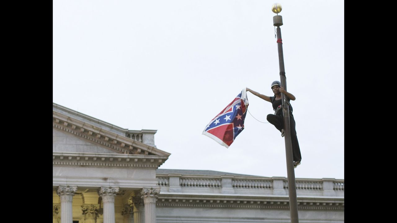 A battle waged against the Confederate flag as a symbol of hatred after Dylann Roof was accused of killing nine people in a South Carolina church in an attempt to spark a race war. Activist Brittany "Bree" Newsome took the battle flag off the flagpole at the Statehouse in Columbia, South Carolina.