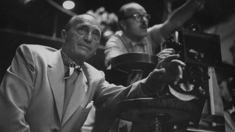 Michael Curtiz behind the scenes during the filming of "White Christmas," a movie/musical that released January 1, 1954. Curtiz was born in Hungary on December 24, 1886. Curtiz directed many of Hollywood's most classic films, but is remembered this time of year for "White Christmas."