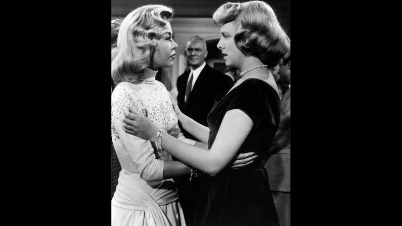 Vera-Ellen celebrates her character's engagement to Kaye's character with co-star Clooney.