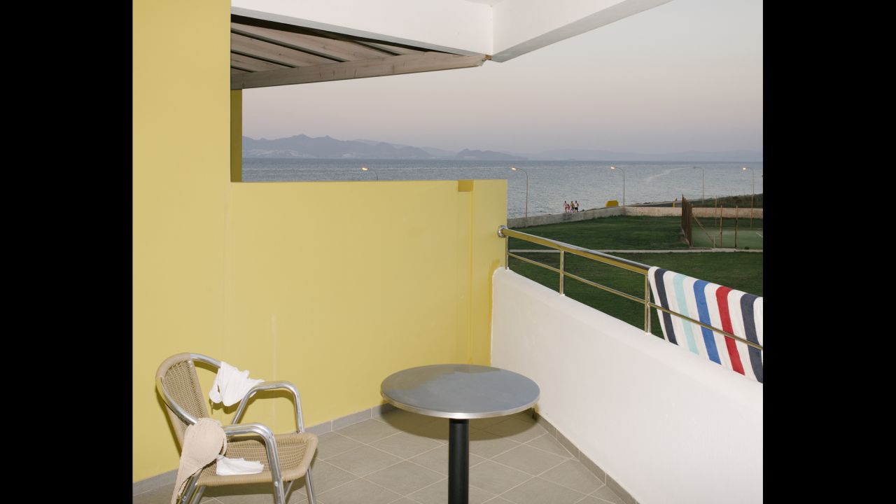 Views of the Turkish mainland can be seen from the balcony of a Kos hotel. The island has always been a popular vacation spot for northern Europeans, according to photographer Jörg Brüggemann.