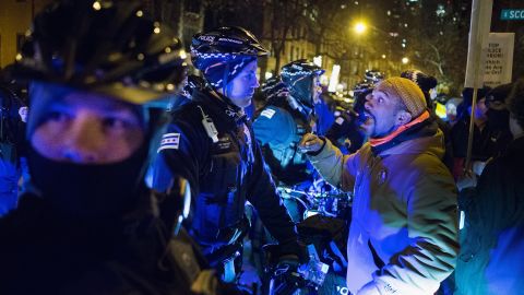 Police blocked off a street as demonstrators marched in Chicago in December 2015. A video showing the shooting of Laquan McDonald by a Chicago police officer sparked almost daily protests in the city at the time. 