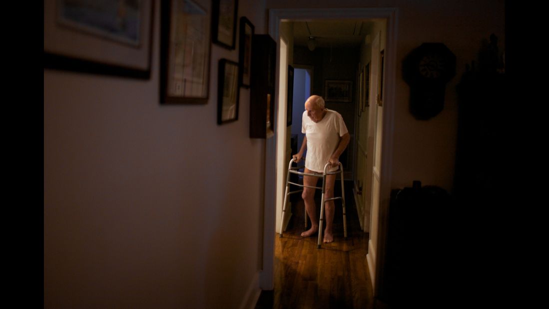 Frampton walks into the kitchen of his Cayce home as his daughter, Christine Power, waits to help him get dressed and prepare for the day. Before his death, Frampton had throat cancer, rheumatic fever and pneumonia.