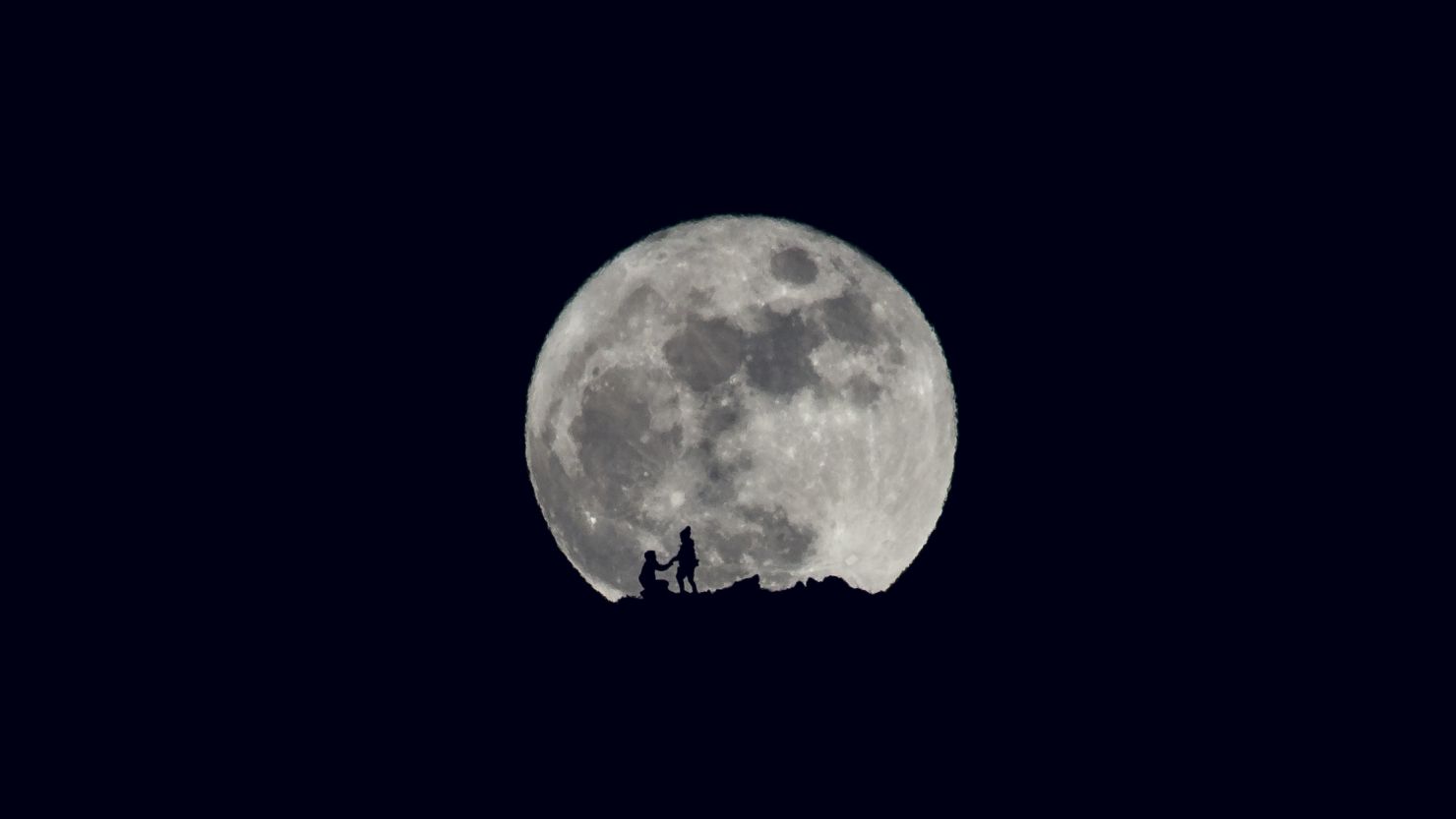 A full moon shines on Christmas in Ohrid, Macedonia. CNN iReporter Stojan Stojanovski photographed the silhouette of a marriage proposal in front of the moon on Friday.