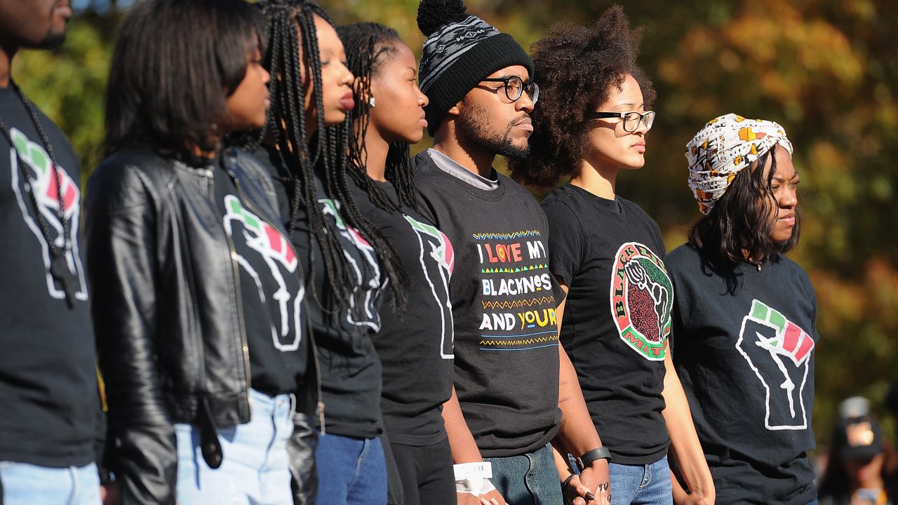 Jonathan Butler (c), a University of Missouri grad student who did a 7-day hunger strike listens during a forum in November after the resignation of Missouri System President Tim Wolfe.