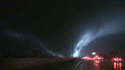 Massive tornado roars across highway_00000000.jpg