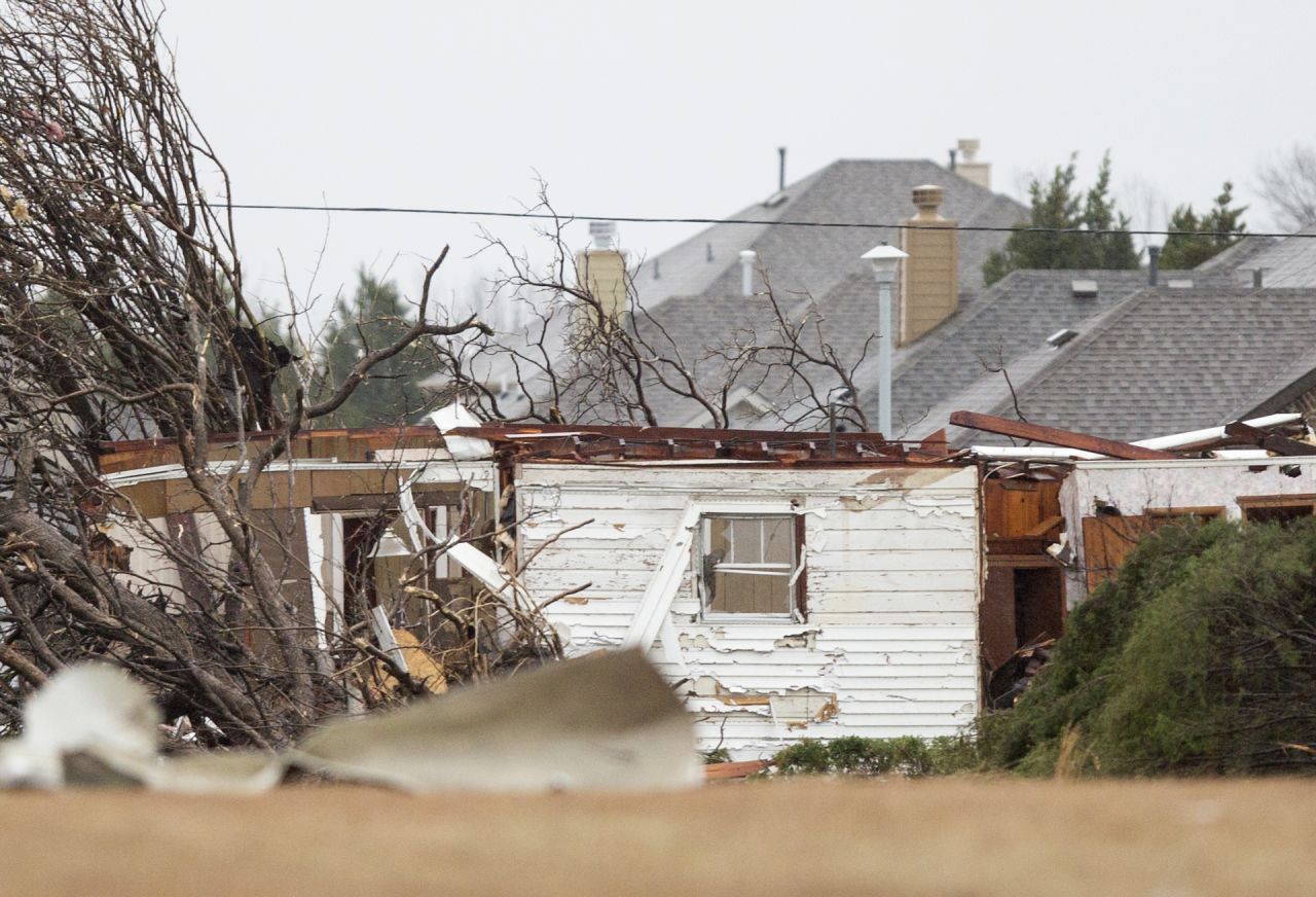 Tornado damage is seen in a neighborhood in Garland on December 27.