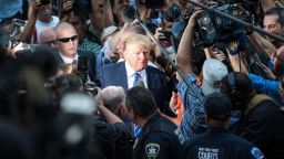 NEW YORK, NY - AUGUST 17:  Republican Presidential hopeful Donald Trump arrives at Manhattan Supreme Court to report for jury duty on August 17, 2015 in New York City. Trump spent the last few days on the campaign trail at the Iowa state fair before returning to New York to perform the civic duty.  (Photo by Andrew Burton/Getty Images)