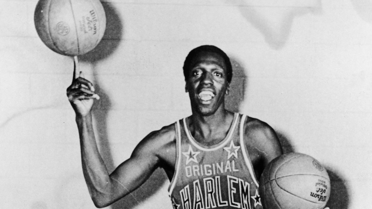 Portrait of American basketball player Meadowlark Lemon of the Harlem Globetrotters balancing a basketball on his finger, May 15, 1968. (Photo by Express Newspapers/Getty Images)