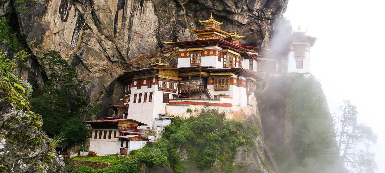The mountain kingdom of Bhutan is home to some of the most stunning peaks and gorges found on Earth. Abercrombie & Kent's Heart of the Himalayas tour includes a visit to the stunning Tiger's Nest Monastery. 
