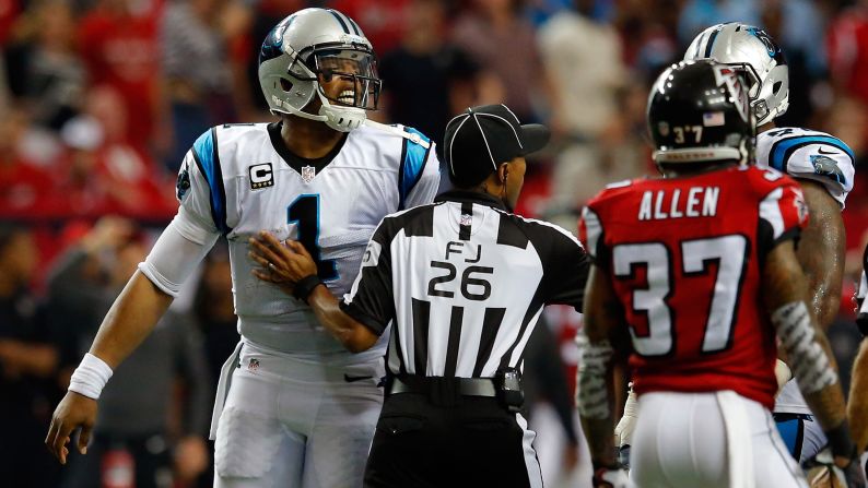 Carolina quarterback Cam Newton, left, reacts to a play during an NFL game in Atlanta on Sunday, December 27. Newton and the Panthers lost for the first time this season, falling to 14-1.