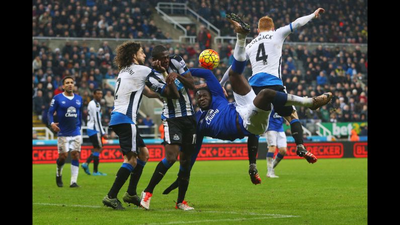 Newcastle players collide with Everton's Romelu Lukaku as he tries an overhead kick Saturday, December 26, in Newcastle upon Tyne, England.