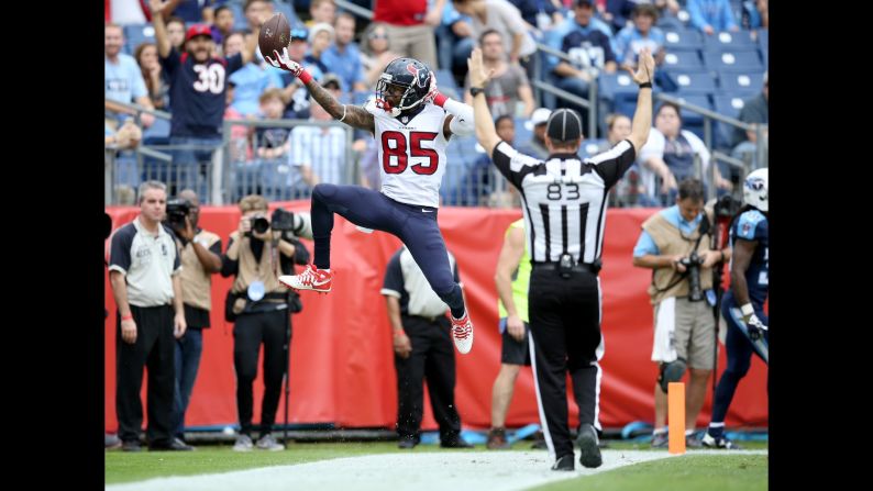 Nate Washington celebrates after he scored a touchdown for Houston during an NFL game in Nashville, Tennessee, on Sunday, December 27. The Texans won 34-6 and moved closer to a division title.