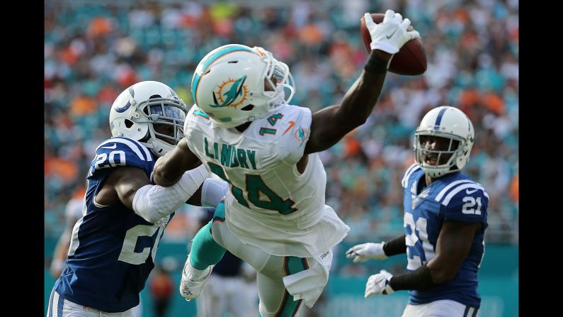 Miami wide receiver Jarvis Landry makes a spectacular one-handed catch against Indianapolis during an NFL game in Miami Gardens, Florida, on Sunday, December 27.