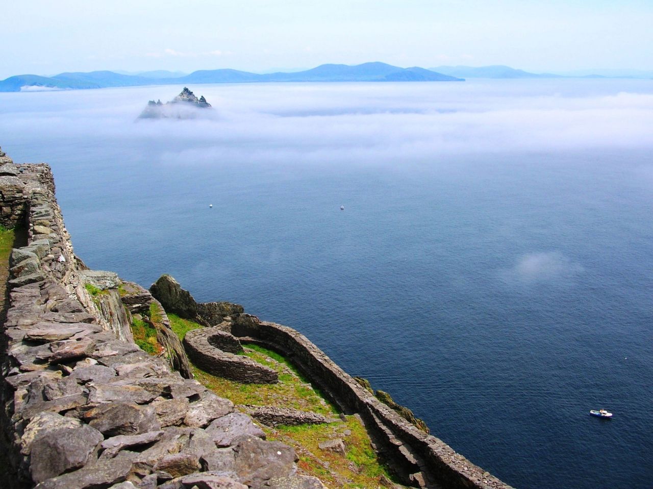This photo, taken from Skellig Michael, shows Little Skellig rising from the mist. The two dramatic sea crags are located 12 kilometers west of Ivereagh Peninsula in Ireland's County Kerry. 
