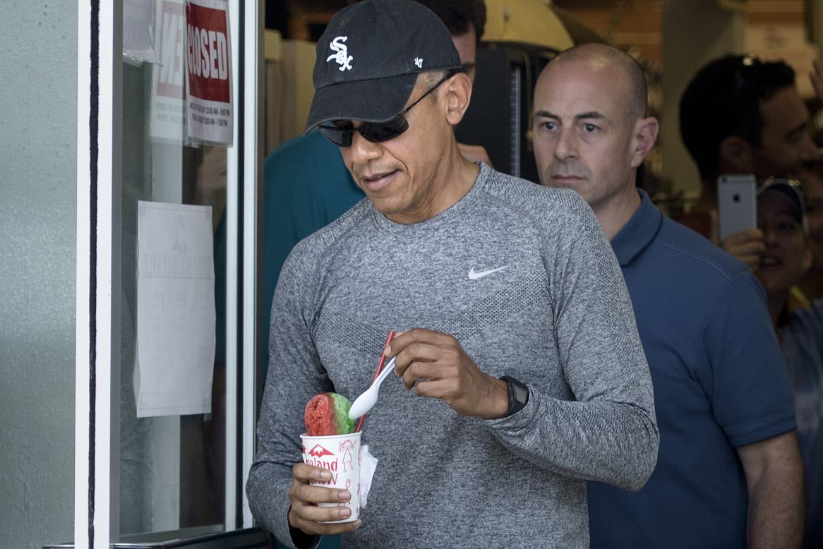 Obama leaves Island Snow with Hawaiian shave ice after a visit to the beach on Sunday, December 27, in Kailua.