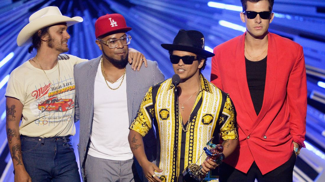Bruno Mars, third from left, who has had numerous No. 1 singles on different chats, is estimated to be worth north of $70 million. 