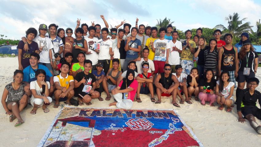 Some 47 young Filipino activists landed on a smal disputed island in the South China Sea Saturday.