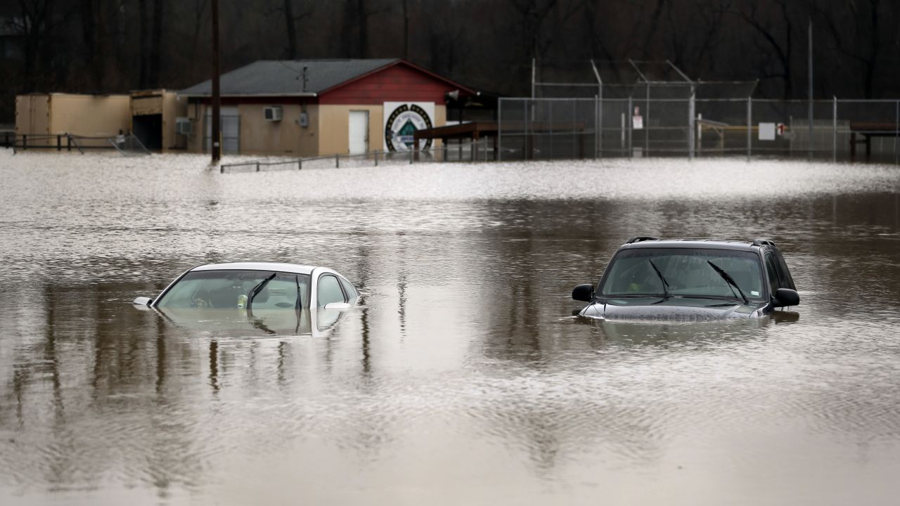 Cars are submerged in flood waters in Kimmswick on December 28.