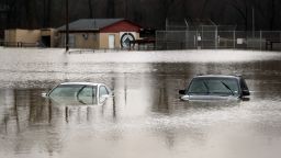 Cars are submerged in floodwaters in Kimmswick on December 28.