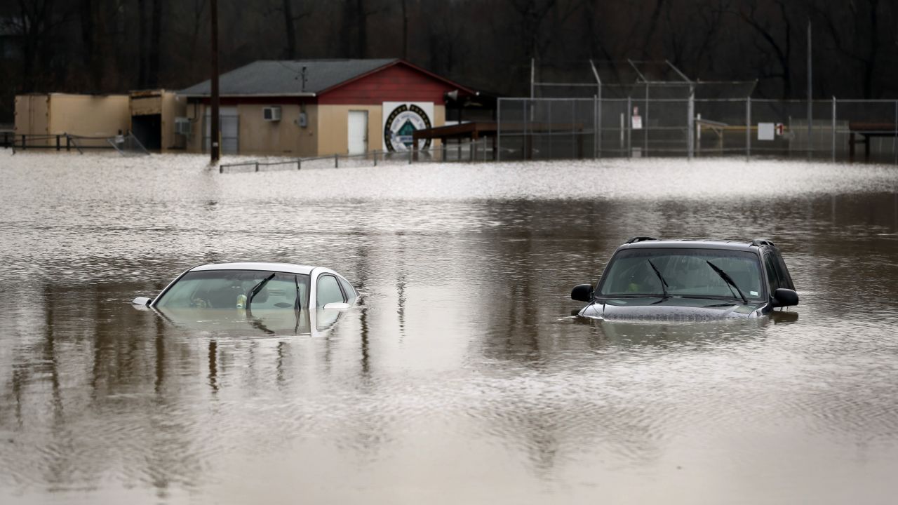 Cars are submerged in floodwaters in Kimmswick, Missouri, on December 28.