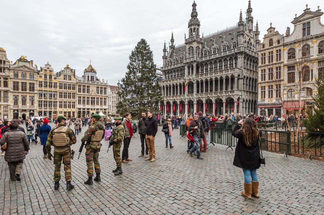 Belgian soldiers patrol Tuesday at the Grand Place in Brussels, mentioned as a possible terror target.