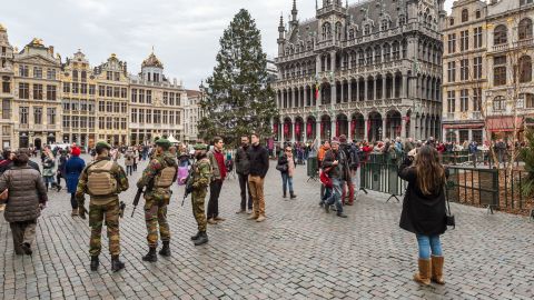 Belgian soldiers patrol Tuesday at the Grand Place in Brussels, mentioned as a possible terror target.