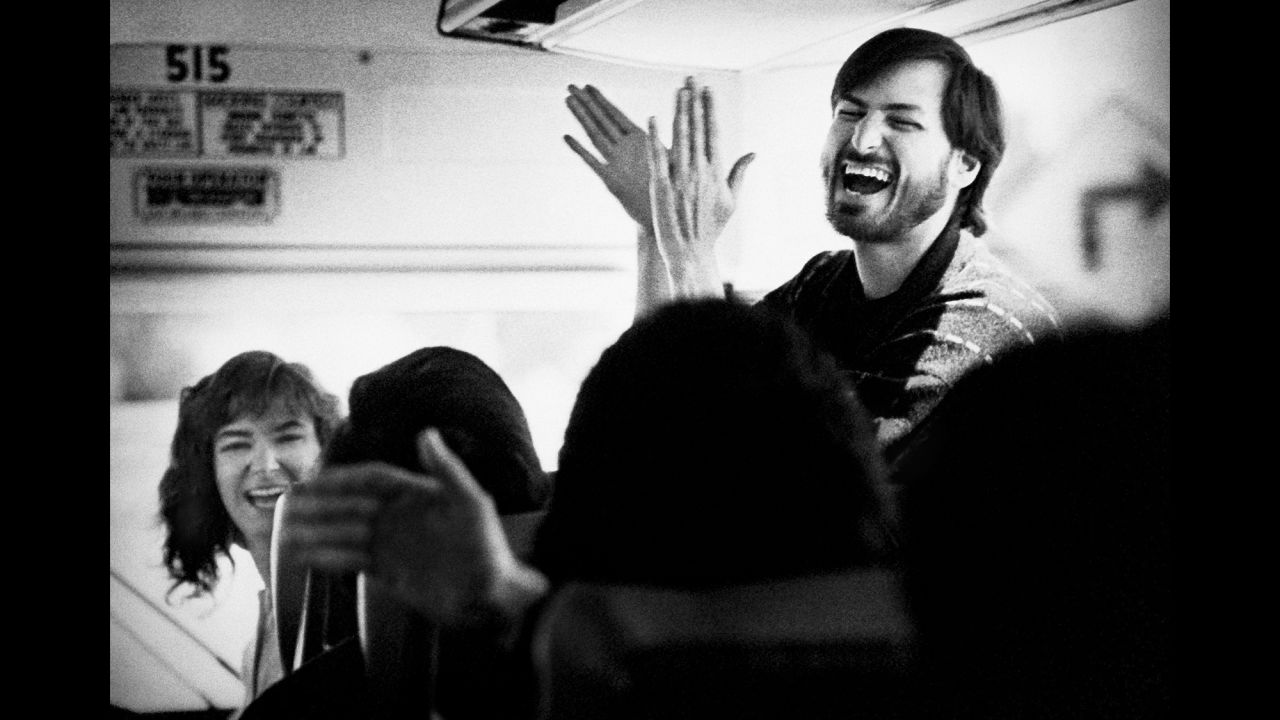 Jobs returns from an employee picnic in 1987. "Although Steve could be extremely rude, critical and even vindictive, he also was incredibly joyful most of the time, with an infectious grin and energy that was irresistible," Menuez said. "Still, I did not observe too many of the unrestrained moments of hilarity as shown here, while Steve was riding an old rented school bus with the company employees."