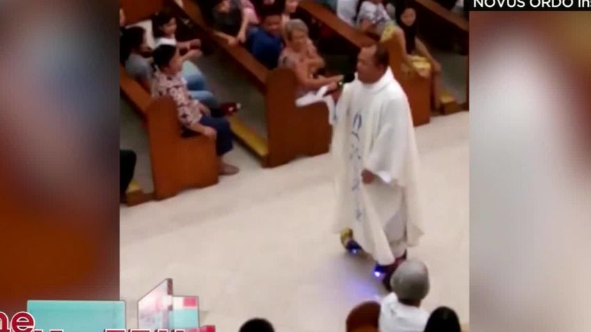philippines-priest-hoverboard-daily-hit-newday_00003128.jpg