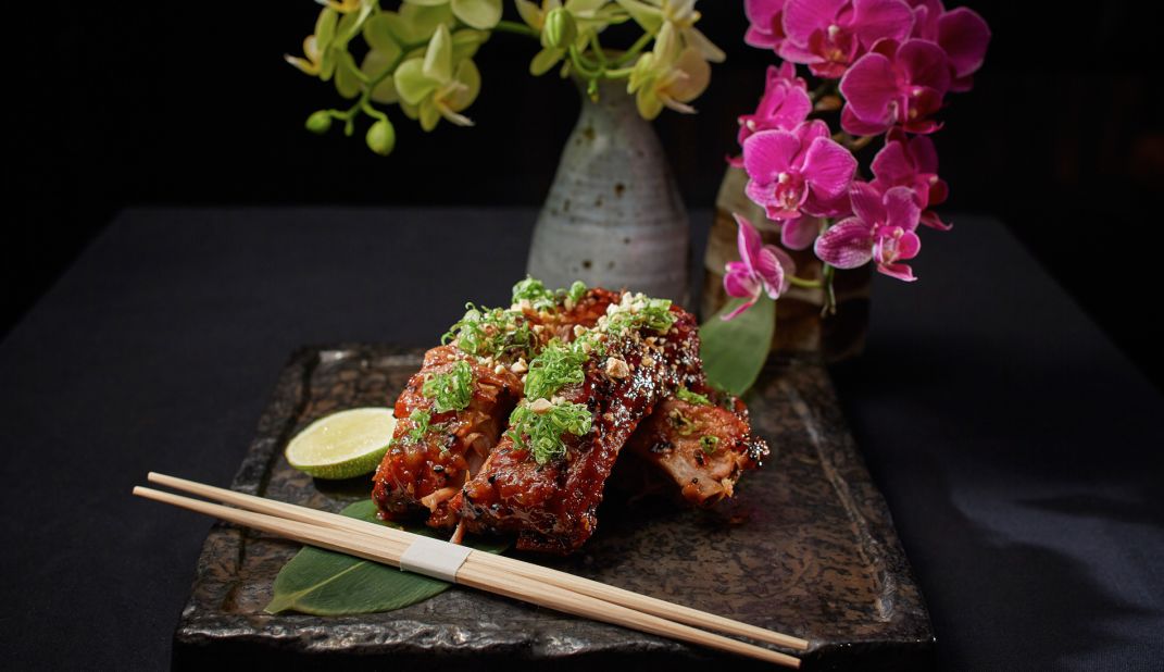 Koko is a new izakaya-style dining spot. In the picture is its baby back pork ribs glazed with a master stock.