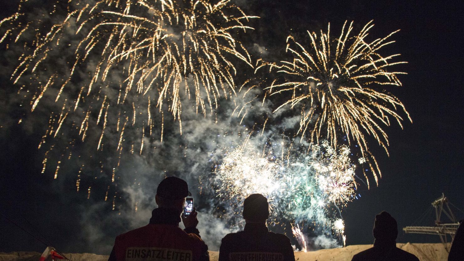 An aid group is asking New Year's revelers to "refrain from using very loud fireworks in close proximity to refugee shelters." The group and government officials cite fire and trauma concerns.