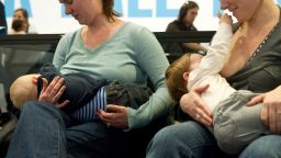 Women breastfeed their babies at the Hirshhorn Museum in Washington on February 12, 2011 during a "nurse-in"organized after a woman was stopped from nursing in public at the museum by security guards two weeks ago.