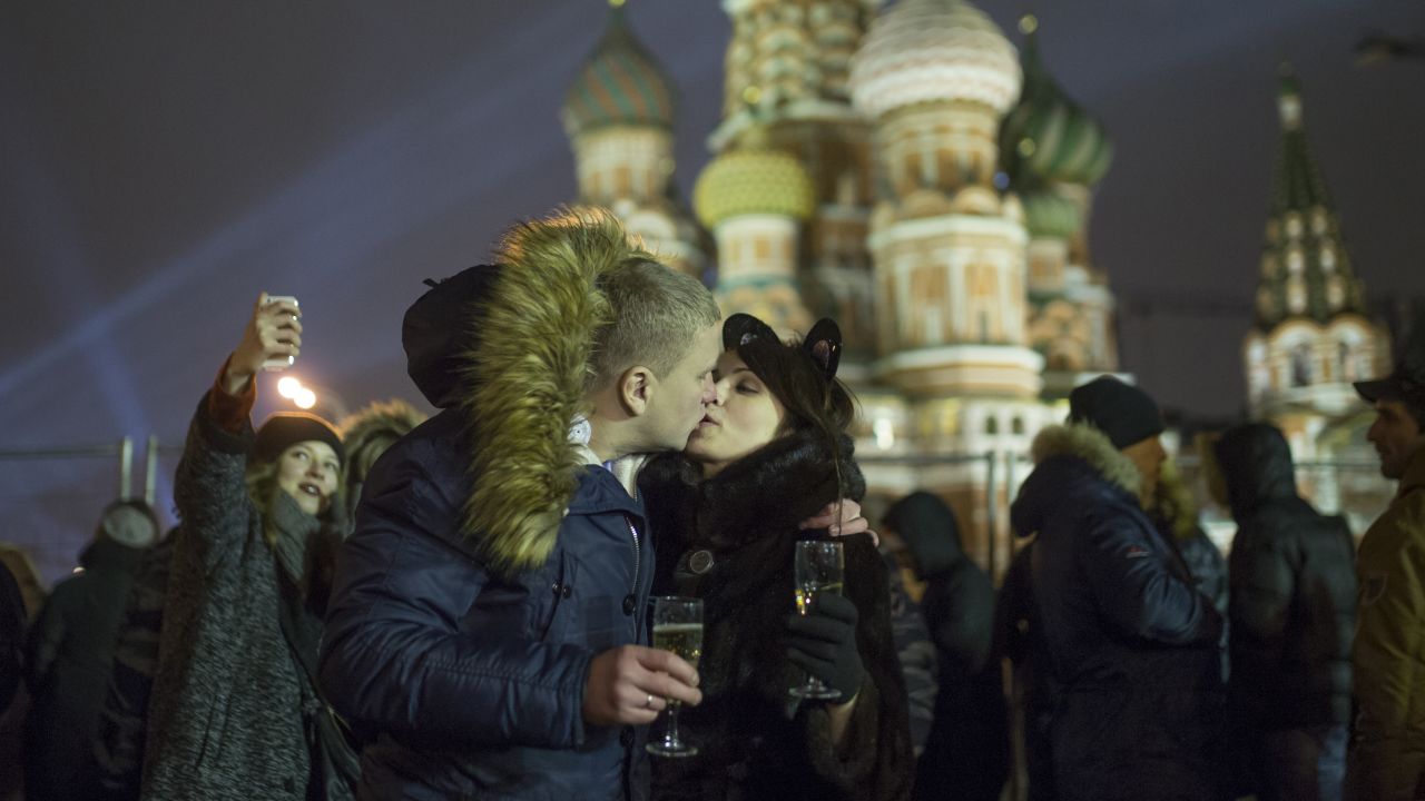 A young couple shares a tender moment in Moscow.
