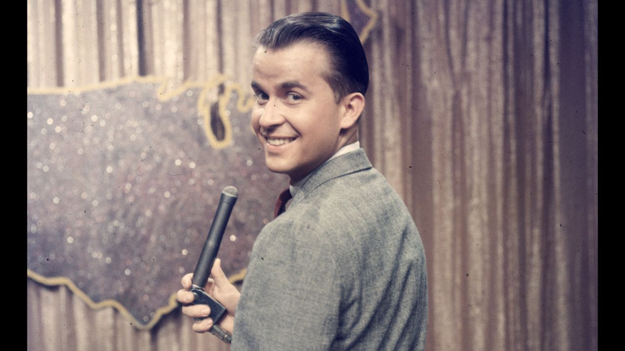 Dick Clark, seen here in 1957, was the model of a good TV host. He readily gave up the stage and dance floor to "American Bandstand" visitors, oversaw "The $10,000 Pyramid" and its relations, and appeared on countless music and entertainment specials before he died in 2012. Seacrest co-hosted "Dick Clark's New Year's Rockin' Eve" with him and considered him a mentor.