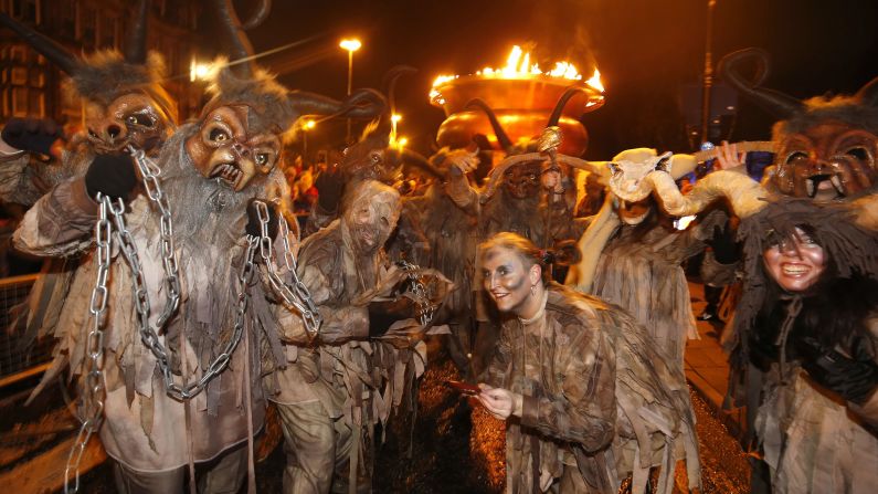Participants take to the street during the Winter Carnival in Newcastle, northeastern England, to celebrate the passing of the old year.
