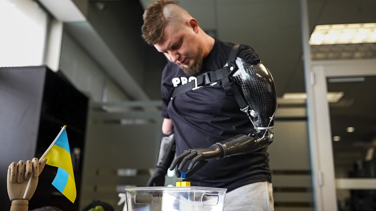 Ukrainian soldier Valera Kucherenko working with his bionic hands.