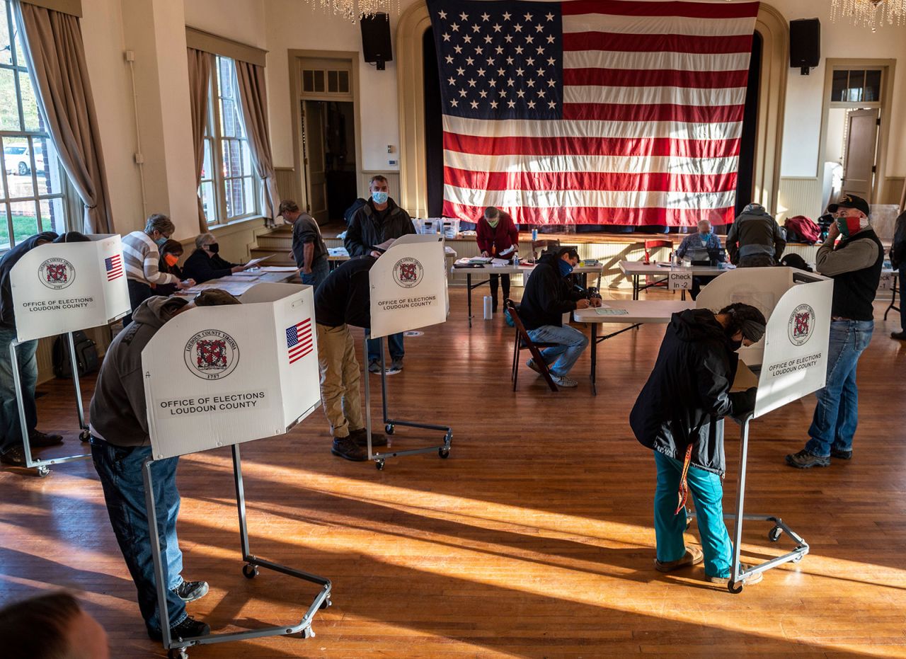 Voters cast their ballots at the old Stone School, used as a polling station, on election day in Hillsboro, Virginia on Tuesday. 