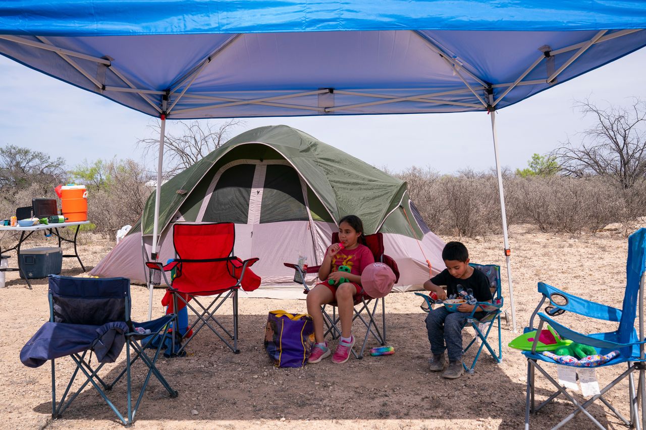 Aria and Zackariah sit at their campsite at the Amistad National Recreation Area. Their family traveled from New Mexico to see the eclipse. “We drove 12 hours!” Aria said.