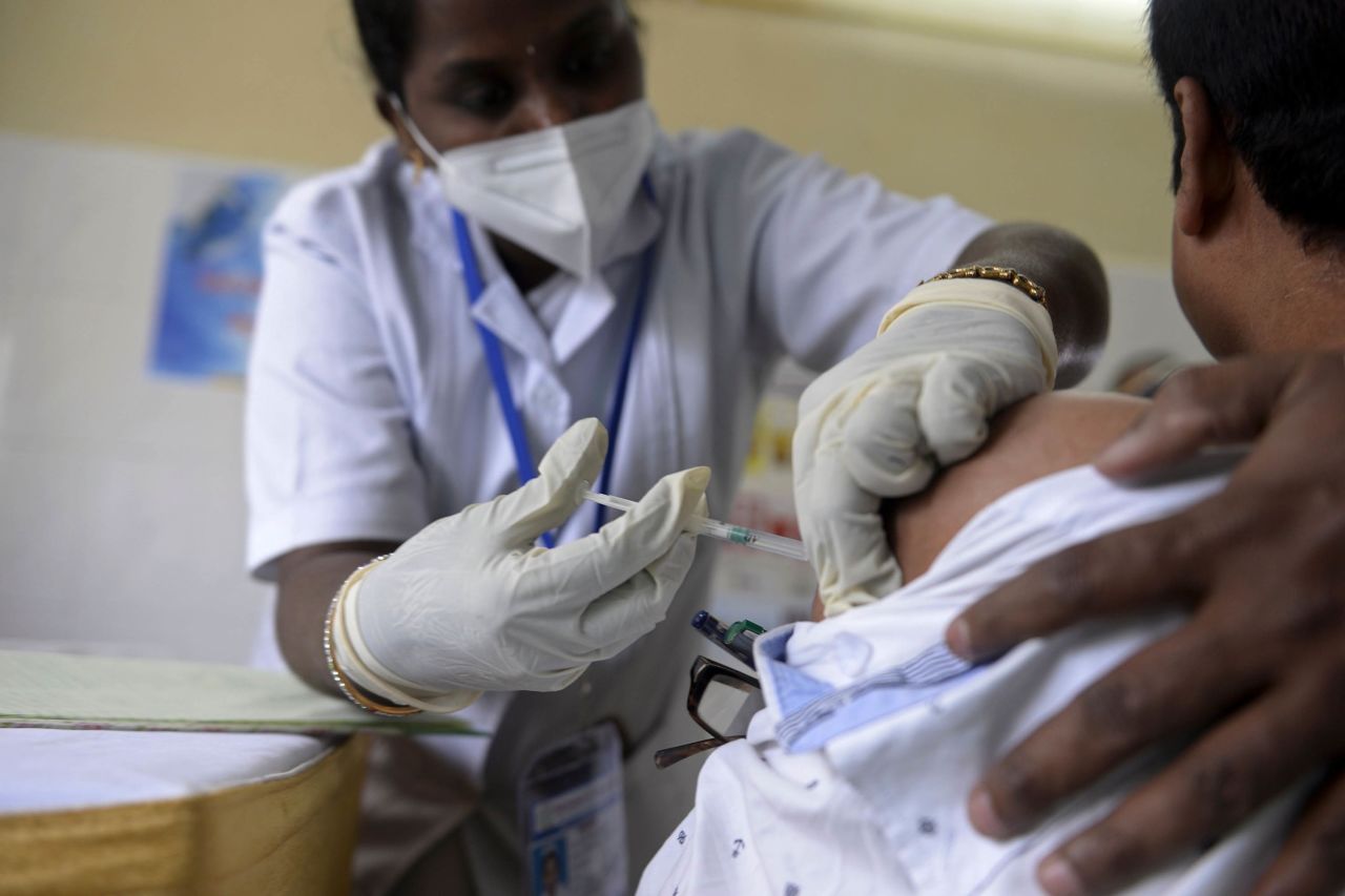 A medical worker inoculates a doctor with a Covid-19 vaccine at Osmania General Hospital in Hyderabad, India, on January 18. 