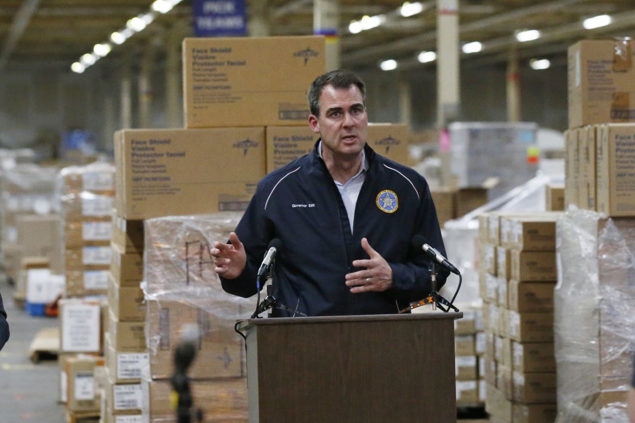 Oklahoma Gov. Kevin Stitt answers questions during a news conference at Oklahoma's Strategic National Stockpile warehouse in Oklahoma City on April 7.