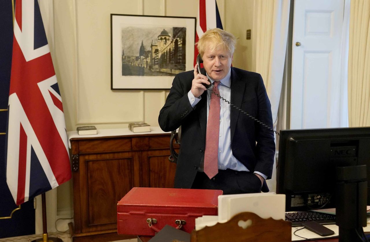 Prime Minister Boris Johnson speaks to Queen Elizabeth II on the phone during their Weekly Audience on March 25.