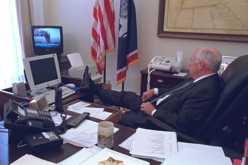 Cheney watches news coverage of the terror attacks on September 11, 2001.