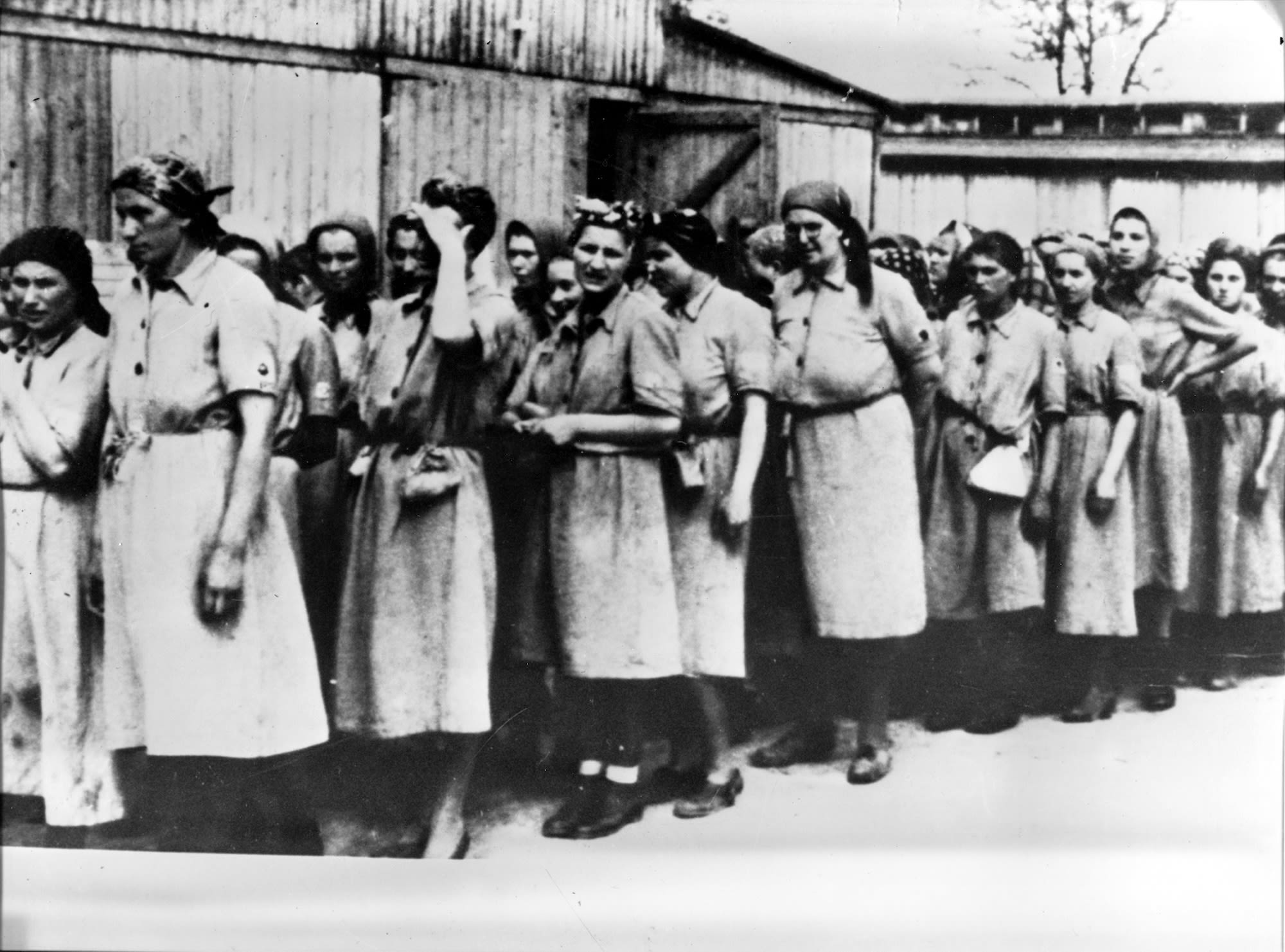 This undated photo, taken by a guard, shows female prisoners lined up for a hard labor assignment.