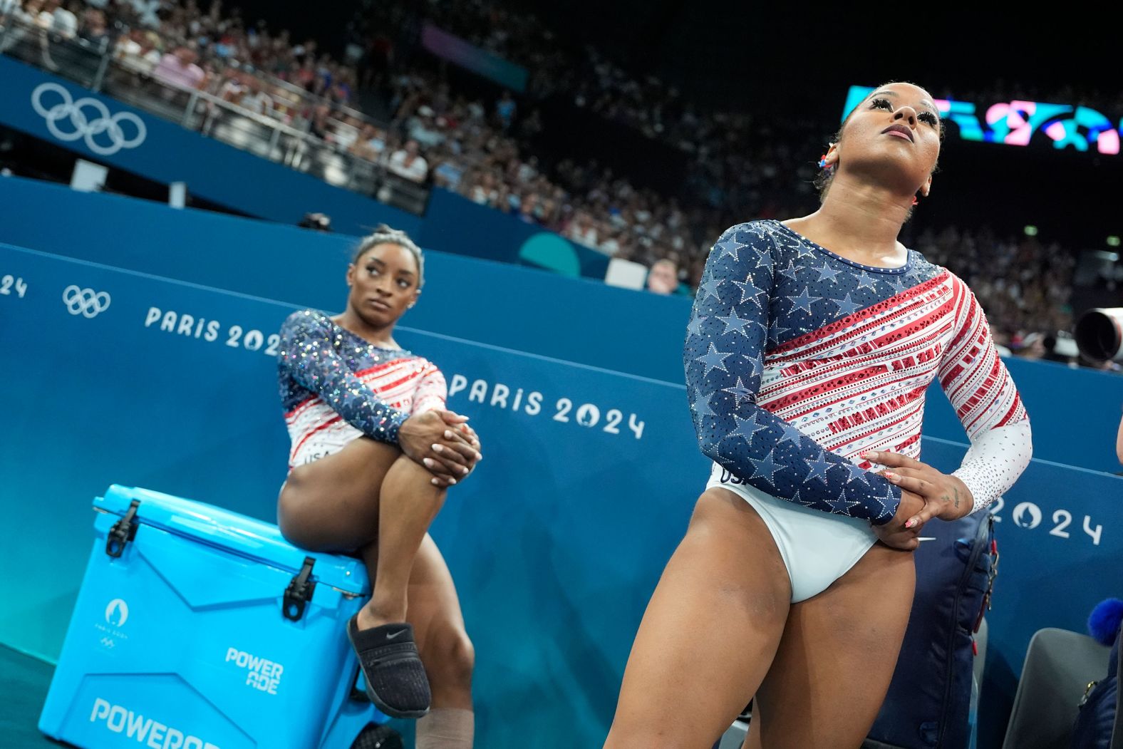 Biles and Chiles wait to compete.