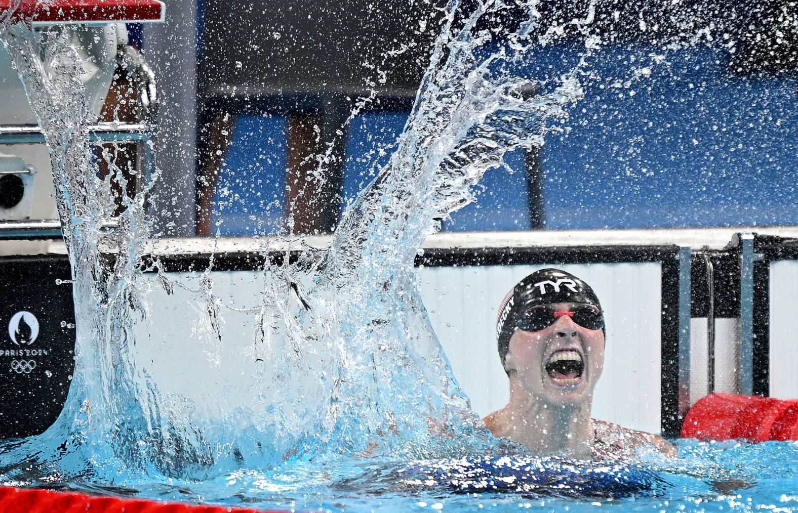 American swimmer Katie Ledecky celebrates after winning Olympic gold in the 1,500-meter freestyle on Wednesday, July 31. The American swimming legend <a href="index.php?page=&url=https%3A%2F%2Fwww.cnn.com%2Fsport%2Flive-news%2Fparis-olympics-news-2024-07-31%23h_37a7aef097fe315f9528ba4e40dd90a3">crushed the rest of the field</a> in her signature event, breaking her own Olympic record in the process. She finished in 15:30.02, a full 10 seconds faster than her closest competitor.