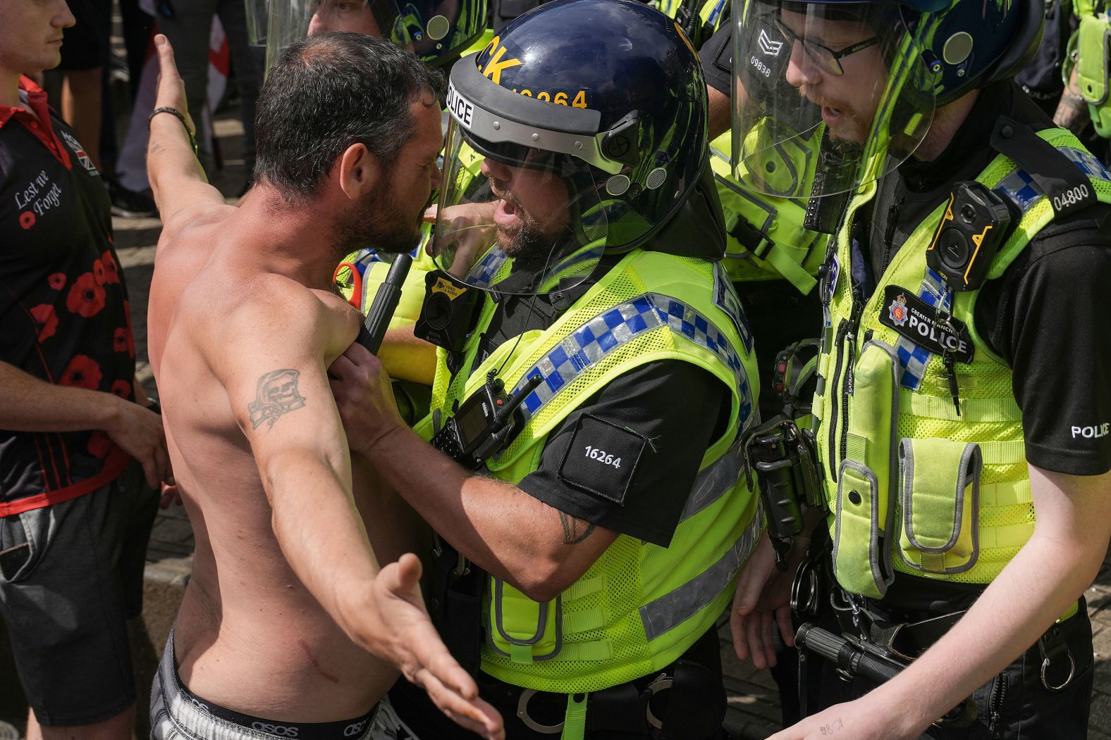 Police clash with right-wing protesters in Manchester, England, on Saturday, August 3. <a href="index.php?page=&url=https%3A%2F%2Fwww.cnn.com%2F2024%2F08%2F05%2Fuk%2Fuk-far-right-protests-explainer-gbr-intl%2Findex.html">Protests first broke out late last month</a> after an anti-immigrant misinformation campaign stoked outrage over a stabbing attack that left three children dead in Southport, England.