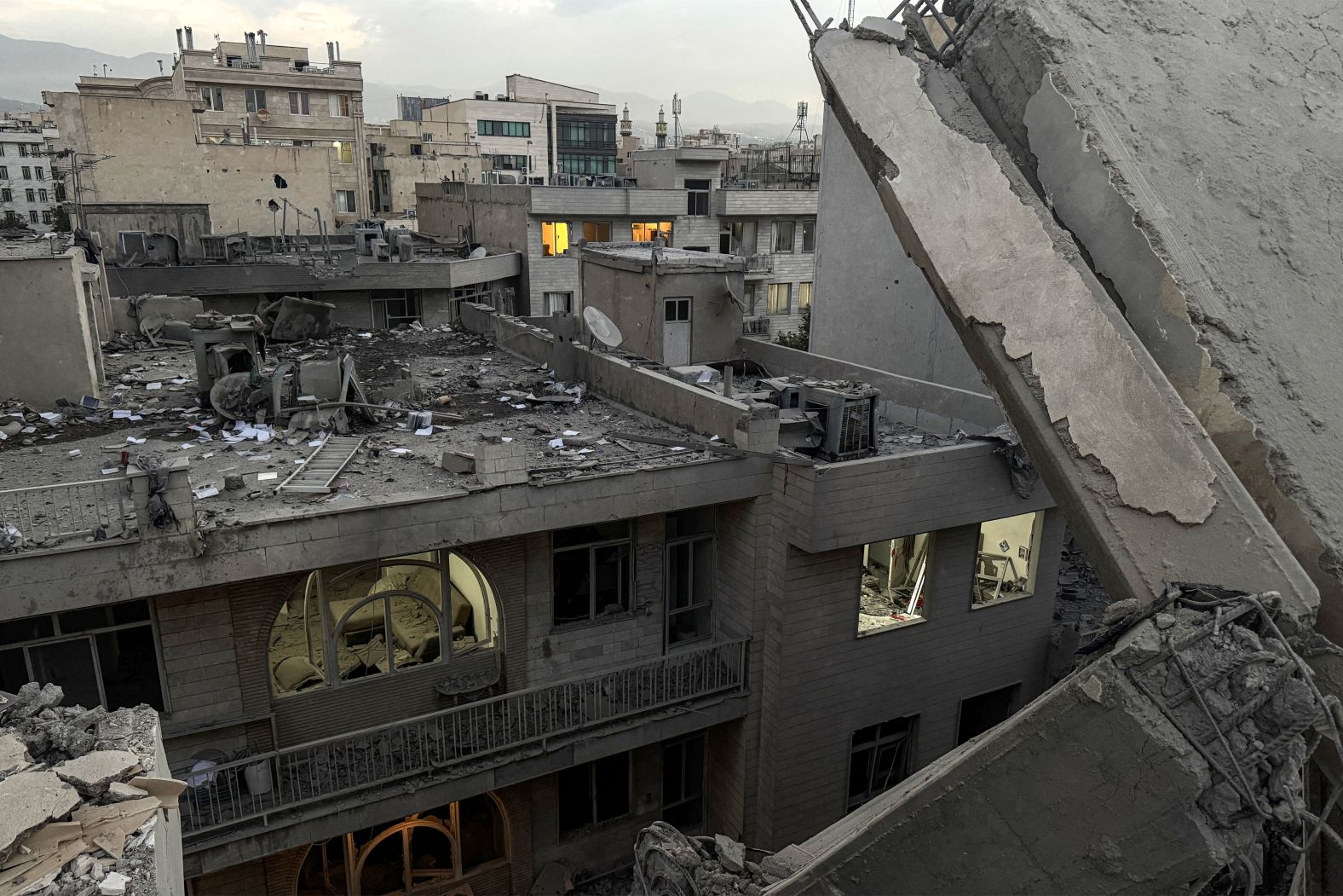 Debris and rubble are seen in Tehran after the Israeli attack on Friday.